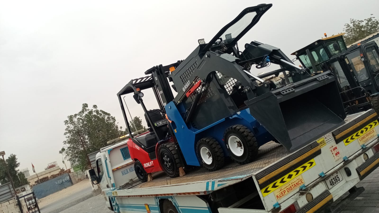 Tow truck carrying a vehicle during recovery service